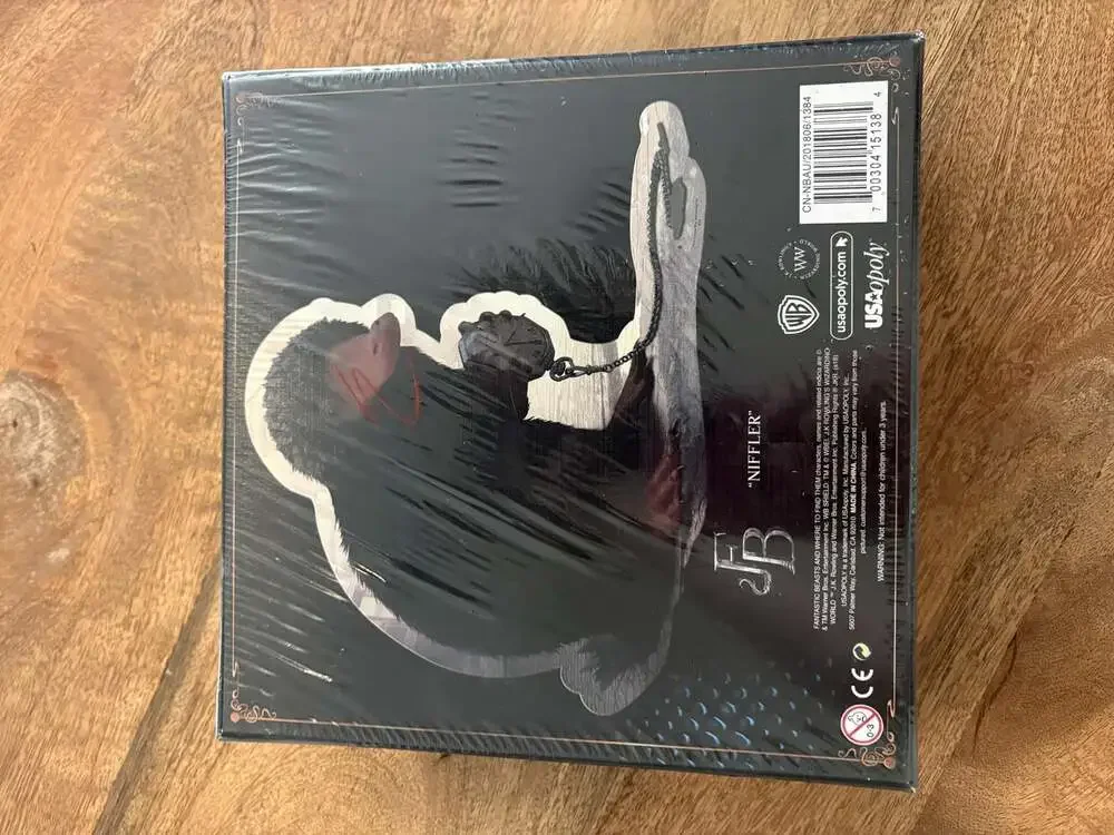 USAopoly Fantastic Beasts Niffler 500 Piece Shaped Jigsaw Puzzle Black Hot Topic